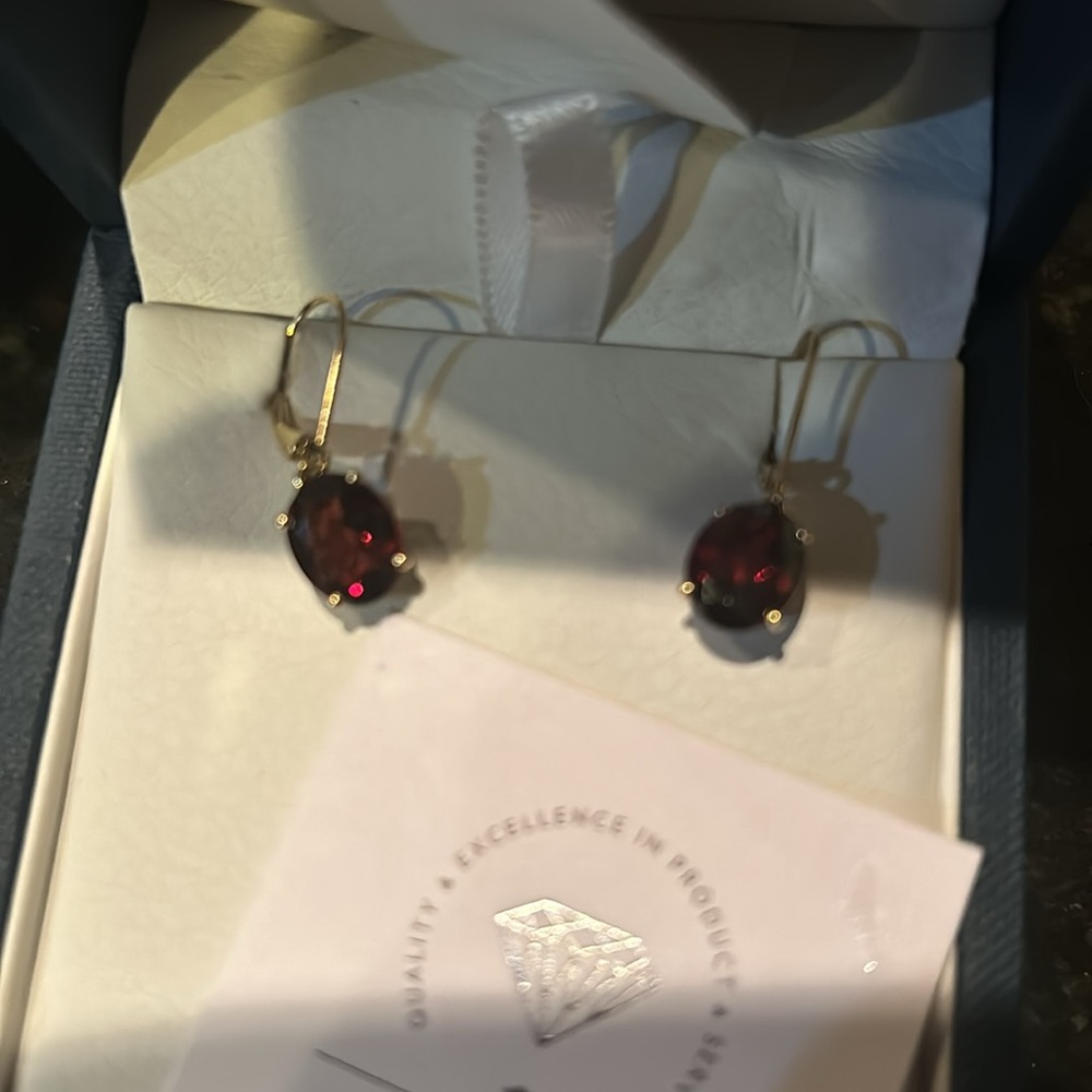 Peora garnet and gold earrings brand new in box